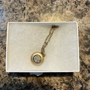 Gold necklace with circle pendant